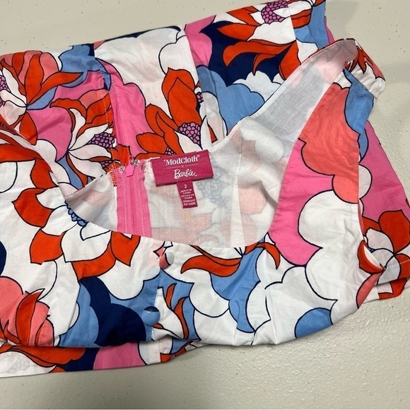 Modcloth x Barbie Retro Repercussions Babydoll Dress in Barbie Cloud Floral - Picture 6 of 10